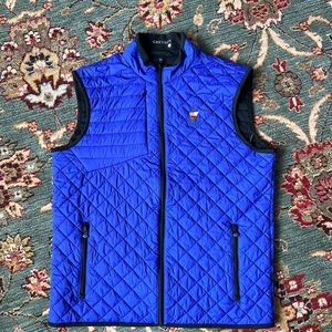 Greyson Yukon Golf vest. Cabot Links Cabot Cliffs. Gently used vest. Blue.Medium
